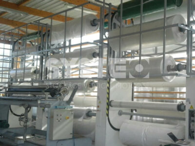 Carrusel giratorio vertical motorizado para almacenamiento de bobinas en una fábrica